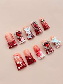 10片装手工制作Y2K风格美甲套装，采用红色法式甲片，镶嵌玫瑰、花朵和十字架等精致饰品。渐变效果搭配大颗红色宝石装饰，亚克力材质的按压式美甲贴片，适合女性和女孩参加派对、日常佩戴，也可作为精美礼品。手工制作的按压式美甲贴片。 - 紅白色 - 查看 2