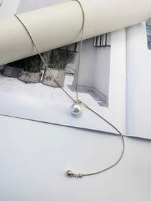 1 件可调节金色珍珠长项链，适合日常佩戴，是送给女性的最佳礼物