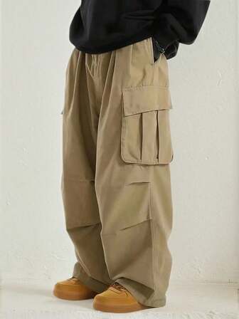 男士休闲时尚工装裤，多口袋设计，适合春秋季穿着。