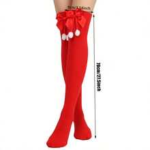 A Pair Of Festive Red Thigh-High Socks With Faux Fur Ball Pendants And Bow Detailing, Stretch-Knit Polyester Blend, Perfect For All Seasons, Machine Washable -