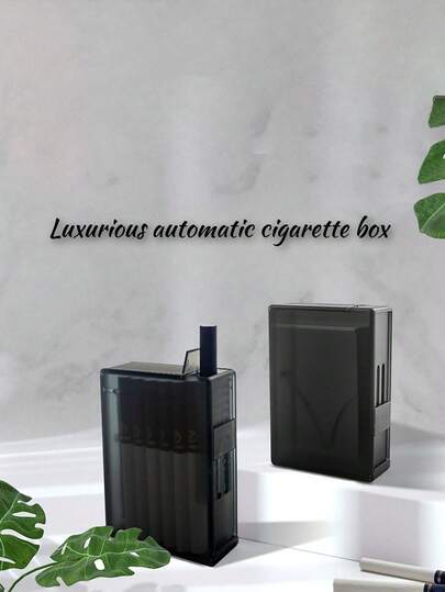 易于使用的极简奢华自动烟盒，透明黑，纯黑。采用优质材料精心打造，散发时尚简约气息，时尚精致的外观设计，轻松取出香烟。矩形设计提供充足的存储空间，可容纳多支香烟，无论是日常使用还是商务场合，都十分实用。这款贴心的配件提升了吸烟体验，彰显您的精致品味。