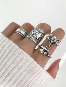 Set de 4 anillos de estilo punk exagerado y estilo hip hop, con diseños vintage tallados en 3D de elefante, pluma y flecha, para mujeres