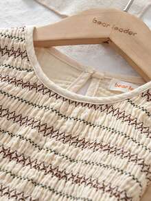 小女孩纯棉长袖圆领粗线上衣和棕色休闲裤两件套秋季或春季服装 3 至 7 岁