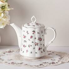 MBB 1 Juego de tetera de cerámica grande con infusor de acero inoxidable, tetera de estilo europeo hecha a mano de cerámica, juego de té vintage para regalo, tetera de 1000 ml (33.5 oz) - Tetera de cerámica premium con infusor para té floreciente y suelto - Tetera de cerámica con decoración de rosas, tetera blanca con decoración de rosas, tetera de 33.5 onzas con tapa, tetera clásica para servir té y café, hecha de nueva porcelana de hueso, apta para lavavajillas, tetera con hojas
