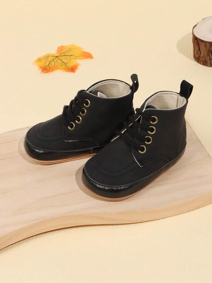 1 par de zapatos casuales planos con diseño de cordones de unicolor y antideslizantes para niños pequeños, botas de moda de caña alta adecuadas para bebés de 0 a 1 año, para primavera/otoño