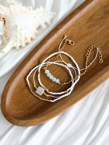 4 piezas Pulsera elástica con cuentas de arroz CCB y cristal sintético, accesorios de moda minimalista y estilo de playa personalizado para mujeres (cuentas de arroz surtidas, sin posicionar)