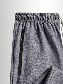 Pantalon de survêtement décontracté pour hommes grande taille - Pantalon de sport doux et léger, convenant pour la course, les entraînements en salle de gym, le port décontracté quotidien, avec cordon de serrage à la taille et poches zippées pour les sports d'hiver - Gris - Voir 3