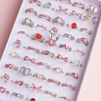 Set de 11 anillos delicados y lindos con rhinestones rosas, regalos de fiesta de cumpleaños para niñas y niños, accesorios de joyería para uso diario