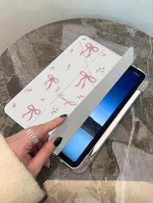 The Beautiful And Cute Cartoon Pink Flower Bow Double-Sided Painted Acrylic Transparent Crystal Back Cover Is Shockproof And Suitable For IPad 7th Generation, 8th Generation (10.2 Inches), And 10th Generation. It Has A Built-In Pen Slot And Supports Sleep And Wake-Up Functions/Multiple Folding Stand Methods. These Are Festival Gifts And New Year Gifts