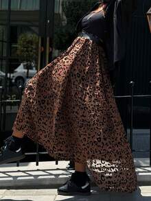 Look Polly Jupe élégante décontractée à taille haute léopard pour femmes en automne-hiver. Style de vacances à la plage digne, avec un sens du style de l'argent ancien. Vêtements occidentaux pour femmes pour les invités de mariage. Jupe en forme de parapluie, imprimé guépard, tenue de Thanksgiving pour femmes