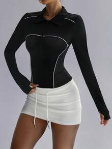 Veste de yoga ajustée zippée à couleurs contrastées, style sportif chic pour femmes. Design élégant pour l'entraînement, la vie quotidienne et les tenues décontractées