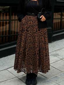 Look Polly Jupe élégante décontractée à taille haute léopard pour femmes en automne-hiver. Style de vacances à la plage digne, avec un sens du style de l'argent ancien. Vêtements occidentaux pour femmes pour les invités de mariage. Jupe en forme de parapluie, imprimé guépard, tenue de Thanksgiving pour femmes