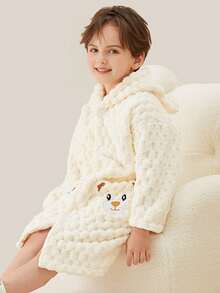 一件可爱儿童连帽浴袍，采用柔软珊瑚绒面料，保暖舒适，男女童皆宜，不掉毛，吸水性强，速干，可机洗，适用于浴室、卧室、酒店、游泳池等场所，也是节日礼物、生日礼物、浴巾、可穿戴毛巾、浴袍、浴室装饰、浴室配件和情人节礼物的理想之选。