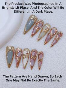 10 件 Y2K Nails 别致杏仁形按压指甲套装 - 手工制作，金色指甲，粉色猫眼和蓝色猫眼，手绘 3D 金色图案设计，闪亮水钻装饰 - 适合女士和女孩，派对、婚礼、日常佩戴、DIY 美甲，美甲套装，包含工具包。哥特式指甲。杏仁色指甲。金色指甲。猫眼色指甲。手工杏仁亚克力按压指甲。假指甲。美甲用品 - 彩色 - 查看 4