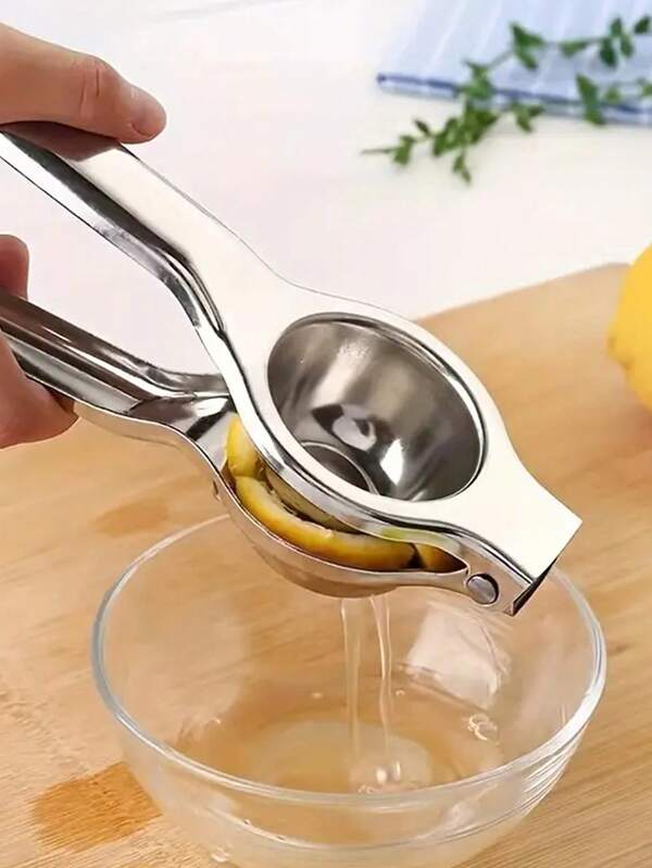 Exprimidor. Exprimidor manual de acero inoxidable resistente. Base firme para limones, naranjas, pomelos - Herramienta de cocina fácil de limpiar para el hogar, restaurante y bar. No necesita energía, exprimidor portátil, acabado metálico elegante, utensilios de cocina duraderos, diseño compacto, construcción robusta, esencial para la cocina del hogar.