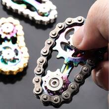 Juguete giratorio con diseño de cadena de bicicleta de 2 engranajes, de acero inoxidable con cojinetes suaves, juguete premium para inquietos - Colorido