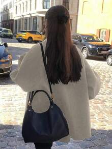 女式简约纯色口袋前扣翻领插肩袖大衣，秋冬