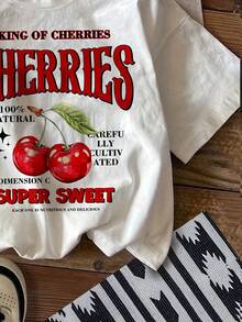 Camiseta informal de cuello redondo para mujer, blanca, con estampado de cerezas y estampado "King of Cherries". Transpirable, lavable a máquina. Moda de primavera. Camiseta estampada de moda. Cómoda y ajustada. Versátil para el día a día. Top elegante. Camiseta ligera. Top estampado. - Blanco - Ver 4