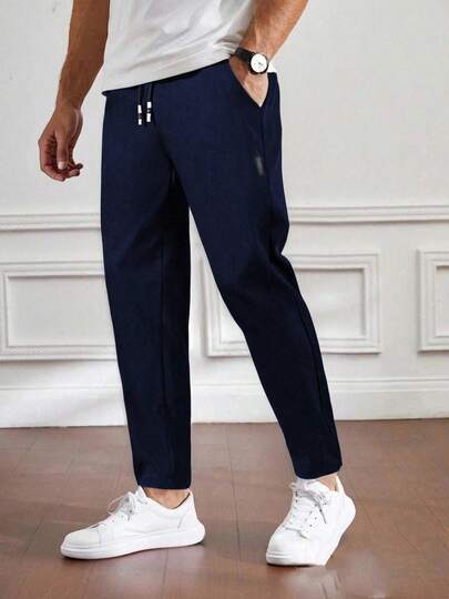 Pantalones de hombre de verano de cintura con cordón y pierna entallada, otoño