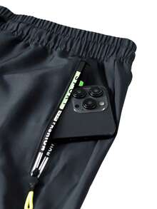 Plus Size Men's Casual Lightweight Cargo Pants, Drawstring Waist, Letter Print, Zipper Pockets, Solid Color, Large Pockets, Suitable For Casual, Sports, Daily Wear