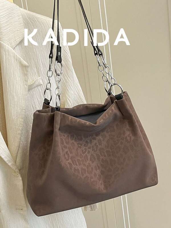 La nueva bolsa de mano de moda atmosférica y exquisita. Bolsa de hombro de gran volumen para ocio y viajes, con estampado popular. Bolsa de hombro con estampado de leopardo para mujer
