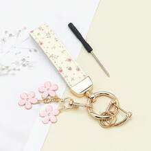 1 breloc elegant din piele PU imprimat cu inel din aliaj de zinc rezistent la rugină, accesoriu de modă pentru femei la modă, potrivit pentru chei auto, chei de ușă și cadouri, breloc, breloc la modă, durabil și robust.