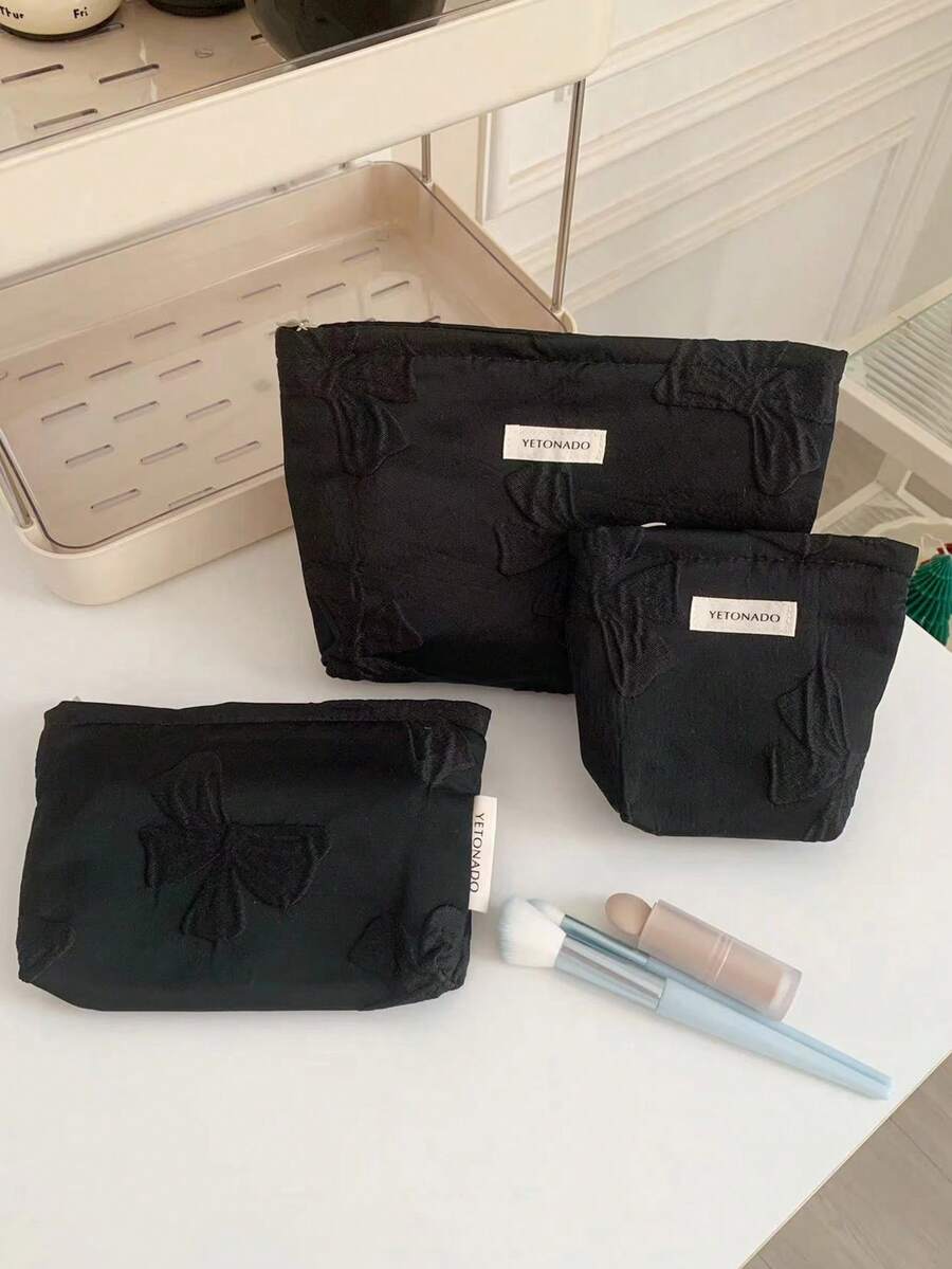 黑色蝴蝶结手拿包，旅行百搭，便携易用，适合返校季化妆包，时尚休闲大容量拉链化妆包，旅行文具收纳包，度假必备化妆包，可装卫生巾、有线耳机、耳塞、头戴式耳机、充电器、口红、香水、护肤品和美容产品，家居装饰，女士、护士适用，化妆包，旅行必备