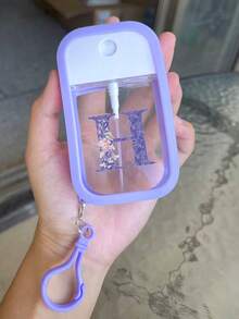 1 chai xịt khử trùng tay dưỡng ẩm, 26 chữ cái màu tím, chai xịt du lịch di động 50ml, giá đựng nước rửa tay bằng silicon có móc khóa, thiết kế quấn toàn bộ, có dây đeo, dễ sử dụng, chất liệu silicon mềm, di động khi đi du lịch, vật dụng cần thiết hàng ngày, du lịch, công việc hàng ngày, vật dụng cần thiết cho trường học, có móc khóa chữ cái màu tím để dễ dàng nhận biết (Sản phẩm này không chứa, vui lòng thêm nước sau khi nhận và mở) - Màu tím - Xem 7