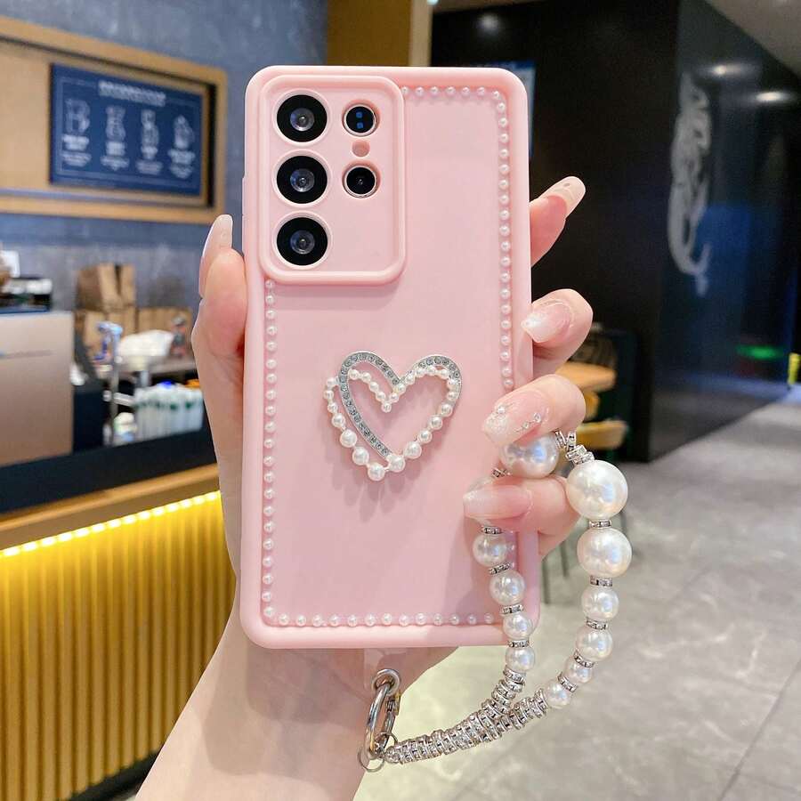Ốp điện thoại DIY ngọc trai, tương thích với iPhone 17/16/15 PRO MAX/15 PLUS/15 PRO/15/14 PRO MAX/14 PLUS/14 PRO/14/13 PRO MAX/13 PRO/13/12 PRO MAX/12 PRO/12 PRO MAX/11 PRO/11/XS MAX/XR/XS/7/8 PLUS/ Ốp bảo vệ trong suốt chống sốc, ốp điện thoại giả ngọc trai kèm dây đeo cổ tay, tương thích với Samsung Galaxy A14 A34 A54 A15 A25 A35 A55 S23 S23Plus S23ultra S23fe S24 S24plus S24ultra S24fe S25 S25plus S25ultra, phù hợp với Note 13/14 Promax - Hồng - Xem 1