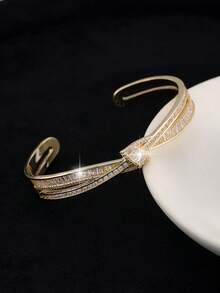 1 pieza Diseño de corbata de moño asimétrico con circonita cúbica brillante de lujo estilo europeo y americano, sensación de alta gama, adecuado para novia, banquete y uso diario para mujeres