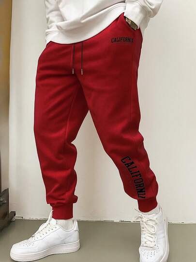 Herren Jogginghose mit Kordelzug, dünne Hose mit elastischem Bund und Buchstaben-Muster, atmungsaktiv und modisch, geeignet für Herbst/Winter
