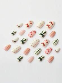 24 piezas de uñas postizas de forma ovalada con estampados navideños como lunares, lazos redondos, bayas de acebo, etc. Estas son uñas acrílicas falsas brillantes y brillantes. Son adecuadas para chicas geniales para fiestas, uso diario, trabajo, citas, fiestas, regalos de Año Nuevo, etc. ¡Pueden realzar tu encanto! Uñas acrílicas para aplicar, uñas navideñas