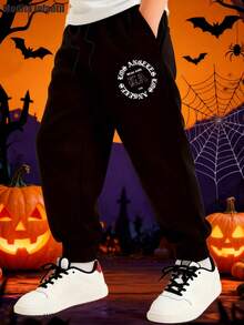 KID006|Pantalones largos de moda para niños| Forrado y cómodo para mantener el calor | HalloweenPantalones suaves para niños con estampado circular en la pierna, perfectos para la época de Halloween, con cordón elástico para una comodidad óptima - Negro - Ver 1