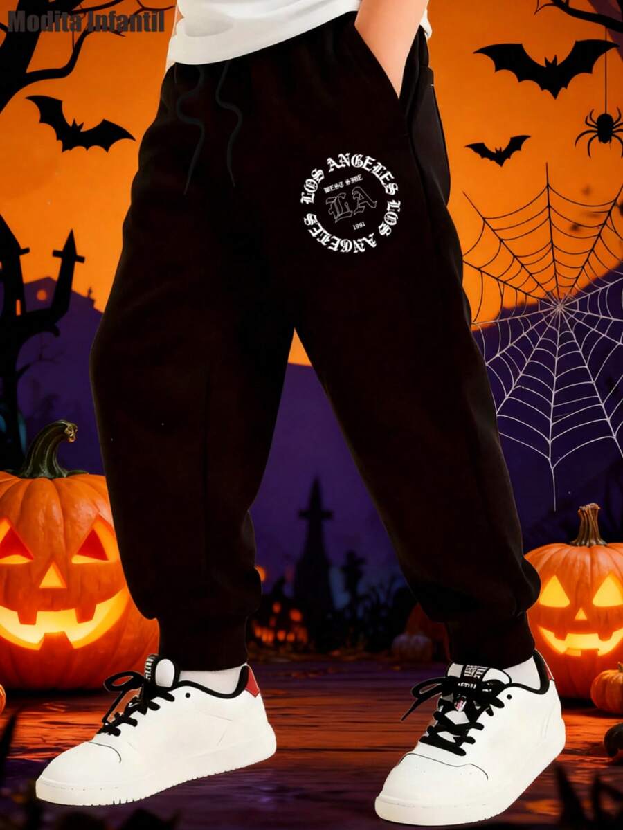 KID006|Pantalones largos de moda para niños| Forrado y cómodo para mantener el calor | HalloweenPantalones suaves para niños con estampado circular en la pierna, perfectos para la época de Halloween, con cordón elástico para una comodidad óptima - Negro - Ver 1