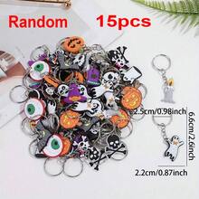 1 set da 15 pezzi, ciondoli e portachiavi casuali per Ognissanti con motivi di cartoni animati, accessori per borse da donna, ciondoli asimmetrici per Ognissanti