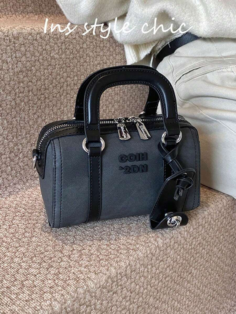 这是一款时尚新款女士手提包，配有可拆卸肩带。这款优雅的女士手提包既有手提带，也有肩带/斜挎带，质感高端，非常适合通勤、聚会、购物和各种场合。 - 黑色 - 查看 1