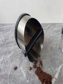 Caixa coletora de borra de café expresso em aço inoxidável, antiderrapante, com anel de borracha e formato inclinado.
