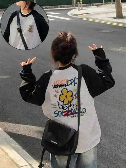 女士宽松休闲百搭印花插肩袖撞色卡通印花长袖T恤 春季