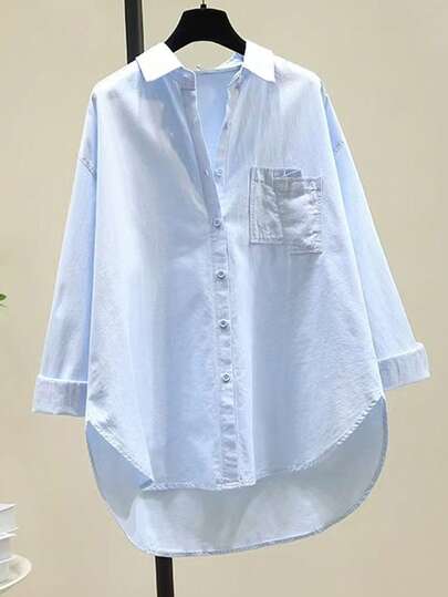Áo sơ mi nữ dài tay cổ bẻ, thiết kế tay áo xắn, cài cúc phía trước, vạt áo bất đối xứng, trang trí túi, kiểu dáng thường ngày mùa xuân.