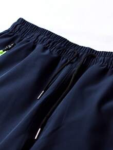 Plus Size Men's Lightweight Cargo Pants, Spring & Autumn, Drawstring Waist, Letter Print, Zipper Pockets, Solid Color, Large Pockets, Suitable For Casual, Sports, Daily Wear