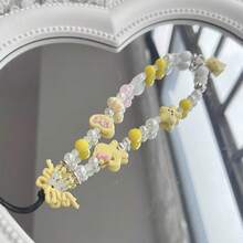 Braccialetto delicato con ciondoli a forma di stella gialla, fiocco e cuore, catena e laccetto da polso per donna