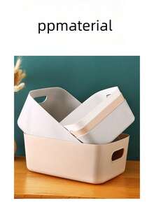 1 pièce de boîte de rangement blanche minimaliste avec des lignes lisses et une forme carrée nette, dotée d'une conception de poignée intégrée très conviviale. Fabriquée en plastique de haute qualité, elle est robuste et facile à nettoyer. Qu'il s'agisse de petits articles de beauté dans la chambre ou de bouteilles et bocaux d'assaisonnement dans la cuisine