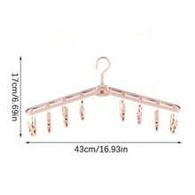 便携式折叠晾衣架，防风设计，配有8个夹子，可晾晒袜子、裤子、衬衫；360°旋转塑料衣架，烤漆表面处理，节省空间，是旅行和居家衣橱收纳的理想之选。经久耐用，易于安装，小巧的晾衣架可快速晾干衣物，用途广泛，适合居家或旅行使用。是宿舍、公寓、小户型以及繁忙家庭寻求整洁洗衣收纳的理想之选。 - 彩色 - 查看 8