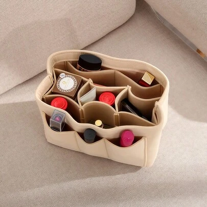 便携式纯色毛毡化妆包，可折叠，带隔层，适合存放洗面奶和护肤品。可放入大包或桌面上收纳化妆品。