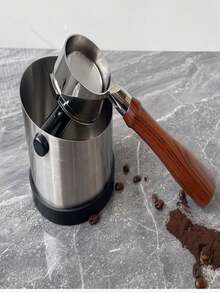 Caixa coletora de borra de café expresso em aço inoxidável, antiderrapante, com anel de borracha e formato inclinado.