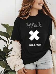 XPLR. Camiseta para mujeres, con gráfico de la palabra. Cómoda poliéster pullover con cordones, de color negro, perfecta para viajes y ocio, diseño deportivo, ajuste cómodo - Negro - Ver 1