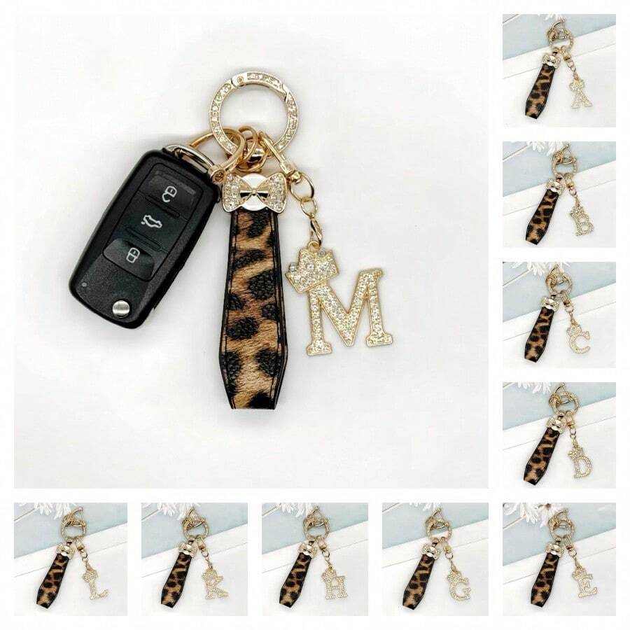 Breloc din aliaj de zinc, 1 bucată, cu design din piele PU imprimată, împreună cu un pandantiv strălucitor cu literă în formă de coroană, strat antirugină, potrivit pentru agățarea cheilor mașinii, cheilor etc. Se potrivește cu orice și este un accesoriu indispensabil pentru a purta!