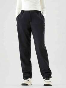 CAMEL CROWN Women's Outdoor Soft Shell Pants, Thermal Lined, Water-Resistant, Windproof, Hiking Trousers For Autumn - Phantom Black - View 1