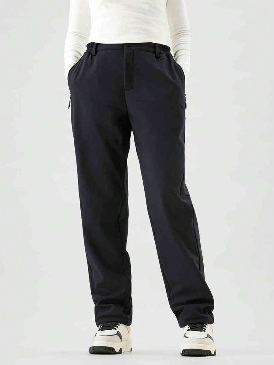 CAMEL CROWN Women's Outdoor Soft Shell Pants, Thermal Lined, Water-Resistant, Windproof, Hiking Trousers For Autumn - Phantom Black - View 1