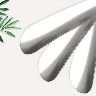 1pc This Stainless Steel Shoe Horn Is A Must - Have Household Item. With Its Long Handle, It Allows You To Put On Shoes Easily While Standing, Eliminating The Need To Bend Down. The Sturdy Stainless Steel Construction Ensures Durability.